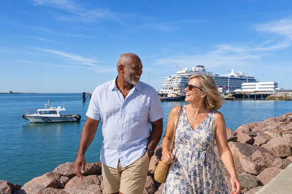 Couple walking by the harbour in Darwin