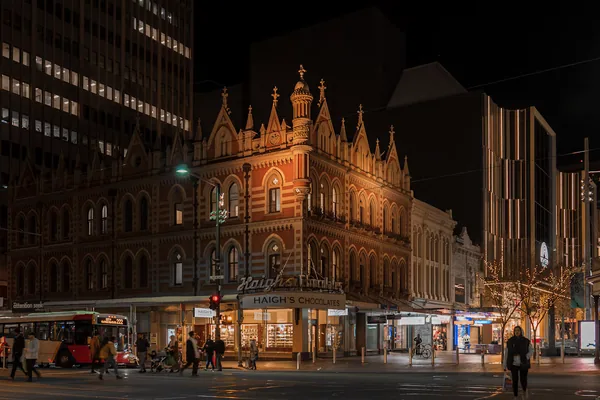 Haighs Chocolates heritage building lit up at night in central Adelaide