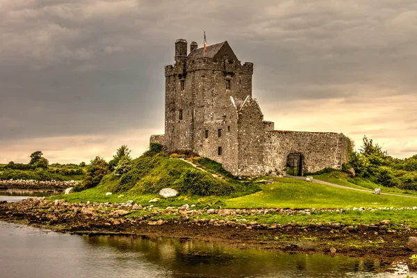 Dunguaire Castle beside the water in County Galway, Ireland