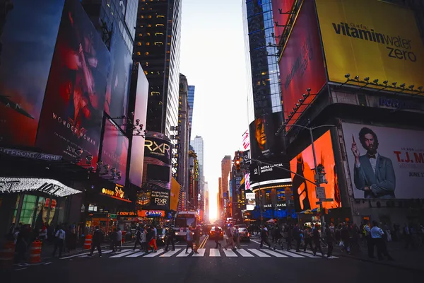 People crossing the street in Times Square, New York City